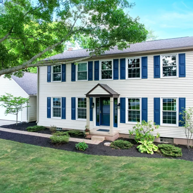 Endure™ Double Hung Windows in White on a Colonial-Style Home