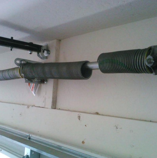 Red torsion spring for garage door